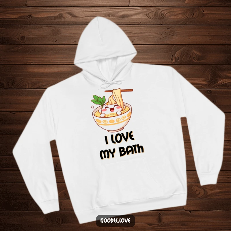 Funny Ramen Bowl Character Splashing Happily in Broth Hoodie - Cozy apparel with a joyful ramen design, perfect funny gift.