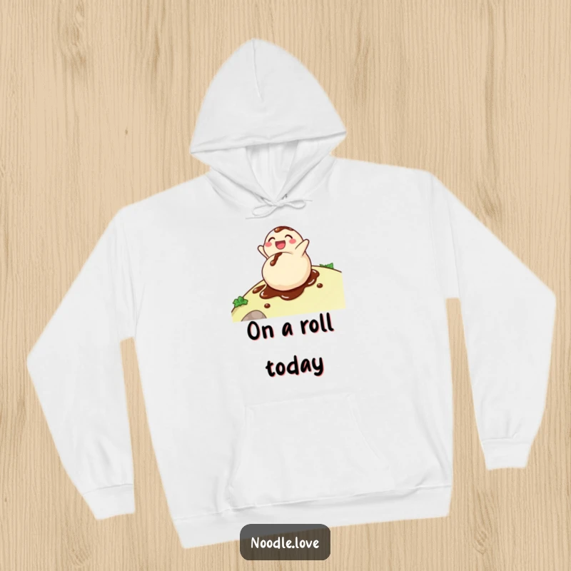 Funny dumpling hoodie featuring a delighted character rolling down a hill, dripping with soy sauce, offering warmth and humor.